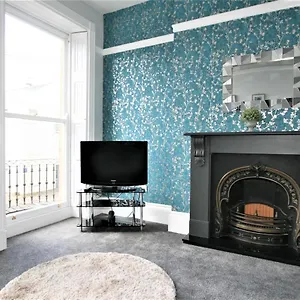 Central Serviced By Roomsbooked Apartment